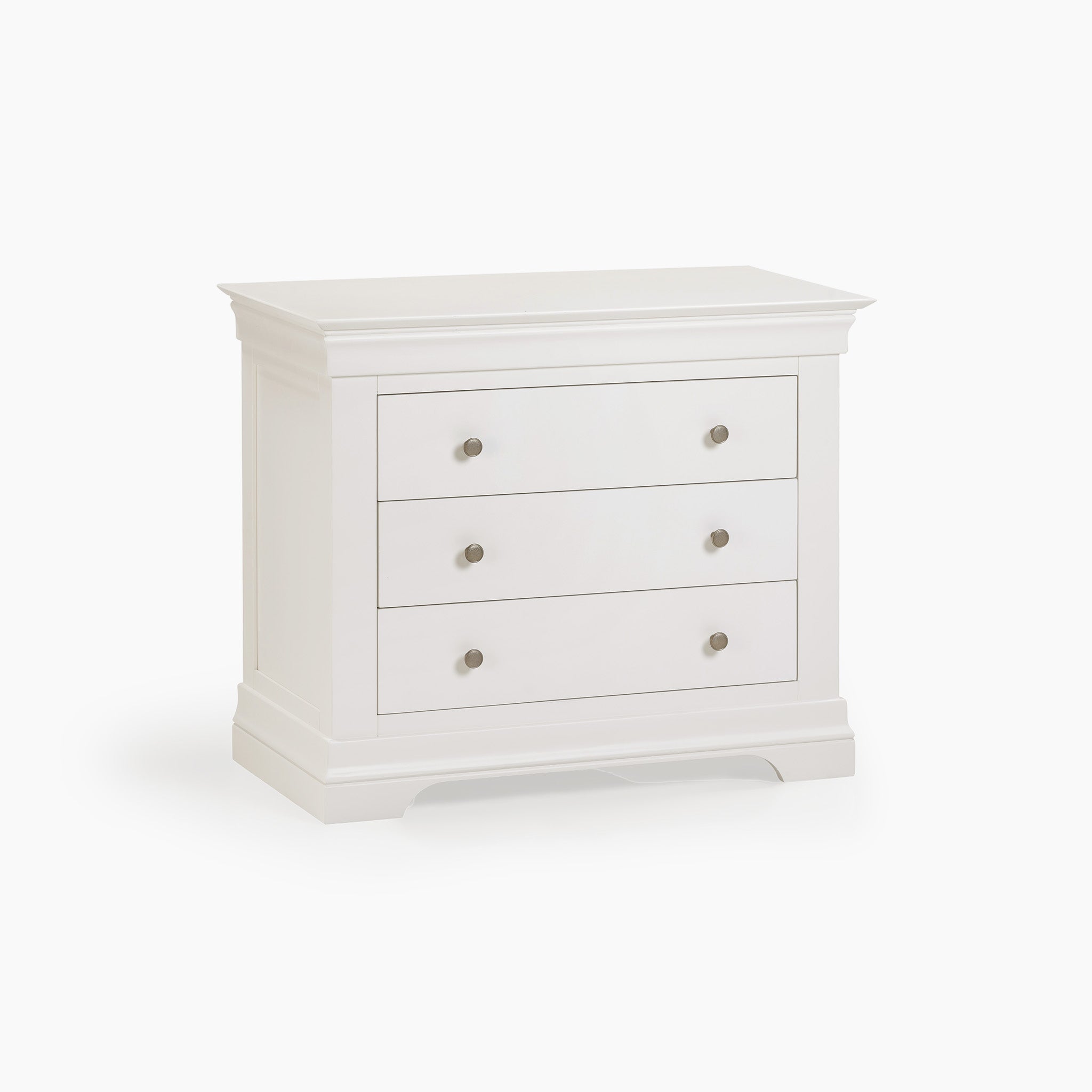 The Chalbury 3 Drawer Chest in Warm White, featuring silver knobs, provides generous storage space against a pristine white backdrop.