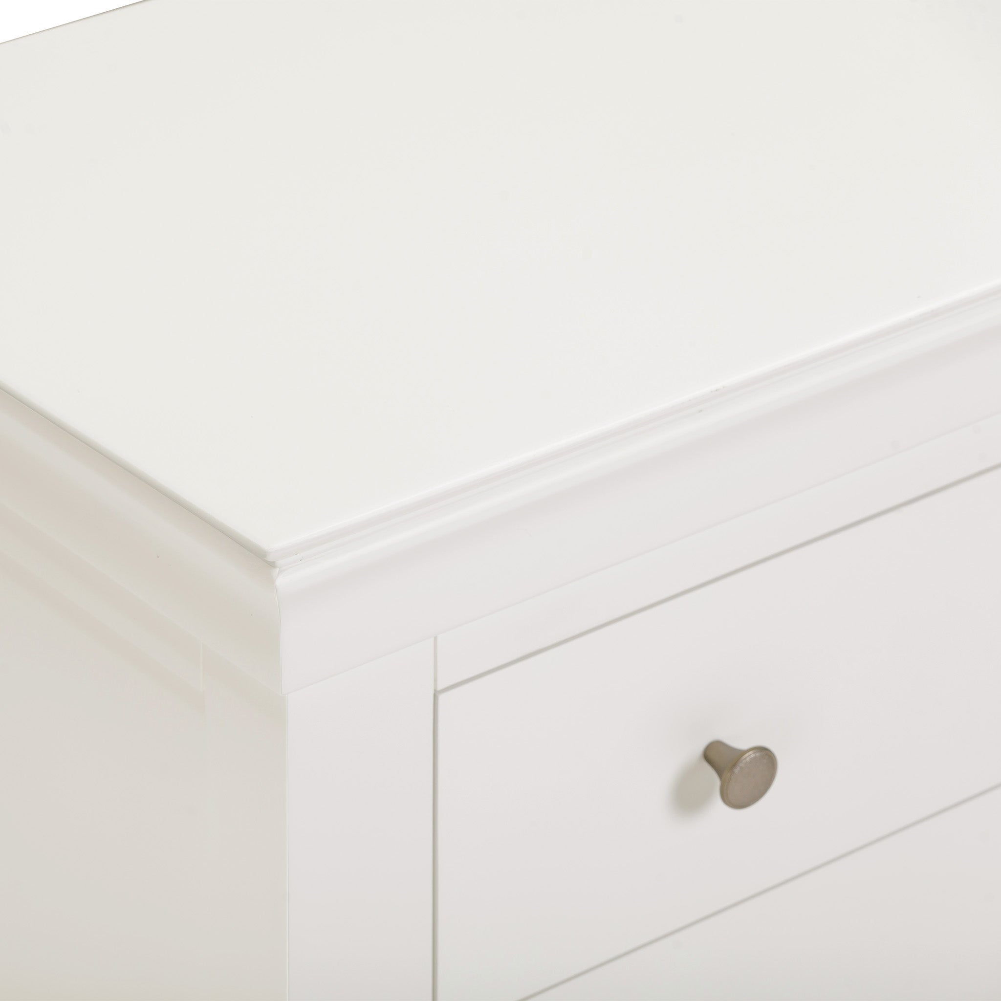 Close-up of the Chalbury 3 Drawer Chest in Warm White, highlighting its smooth, minimalist design with a single metallic drawer knob.