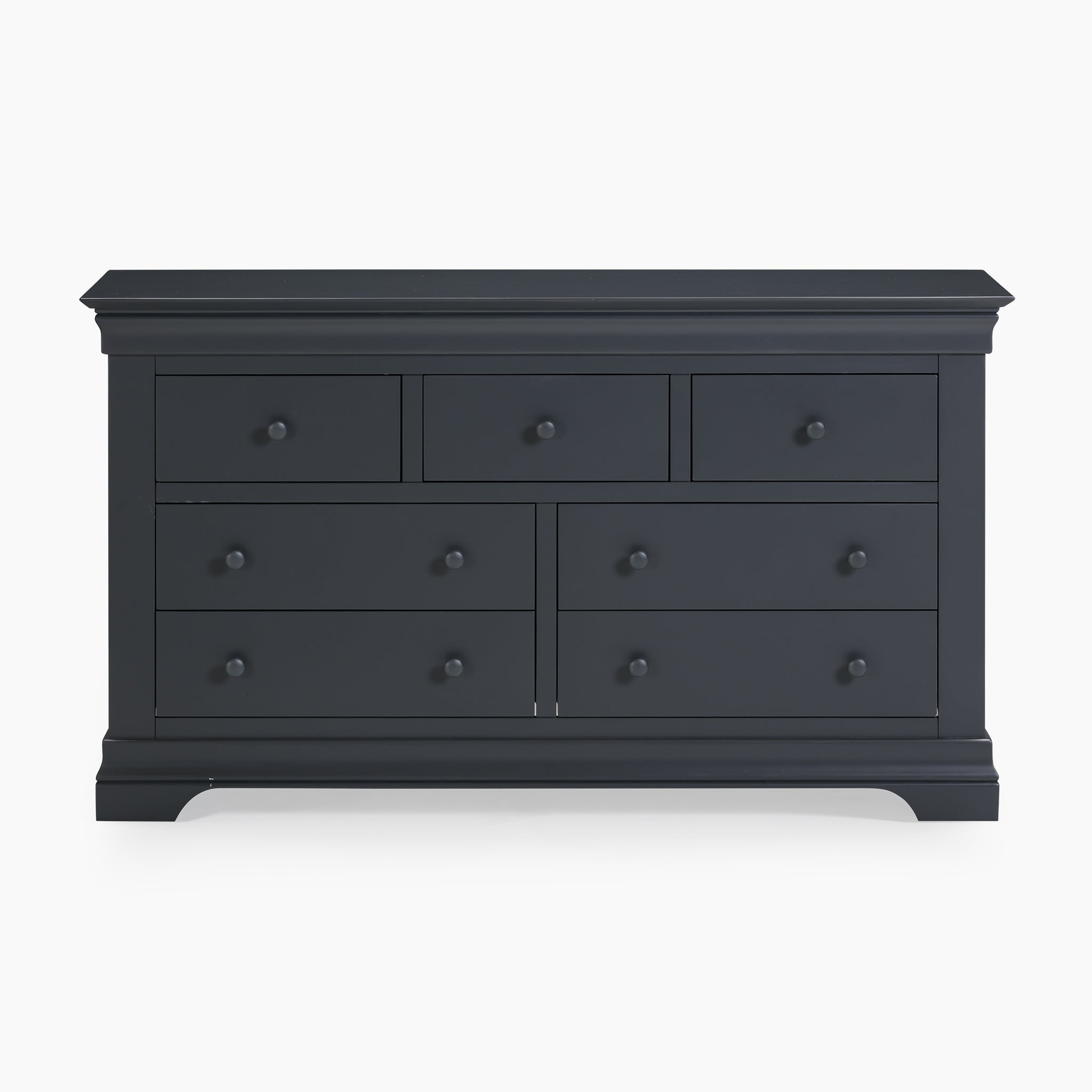 Chalbury 3 Over 4 Chest of Drawers in Dusky Black with rounded knobs is elegantly set against a white background.