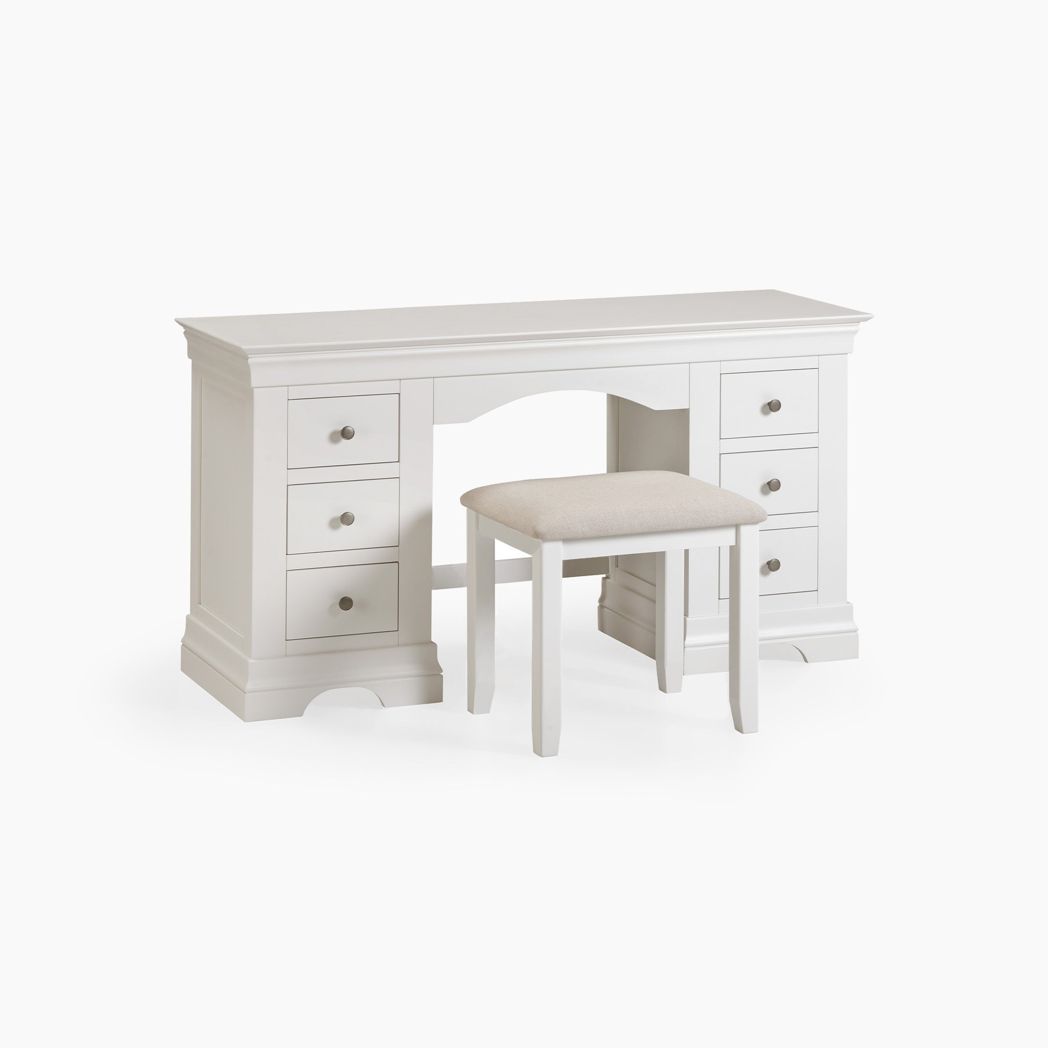 The Chalbury Dressing Table with Drawers in Warm White showcases a sleek design, featuring six drawers and a matching cushioned stool, ideal for adding elegance to any space.