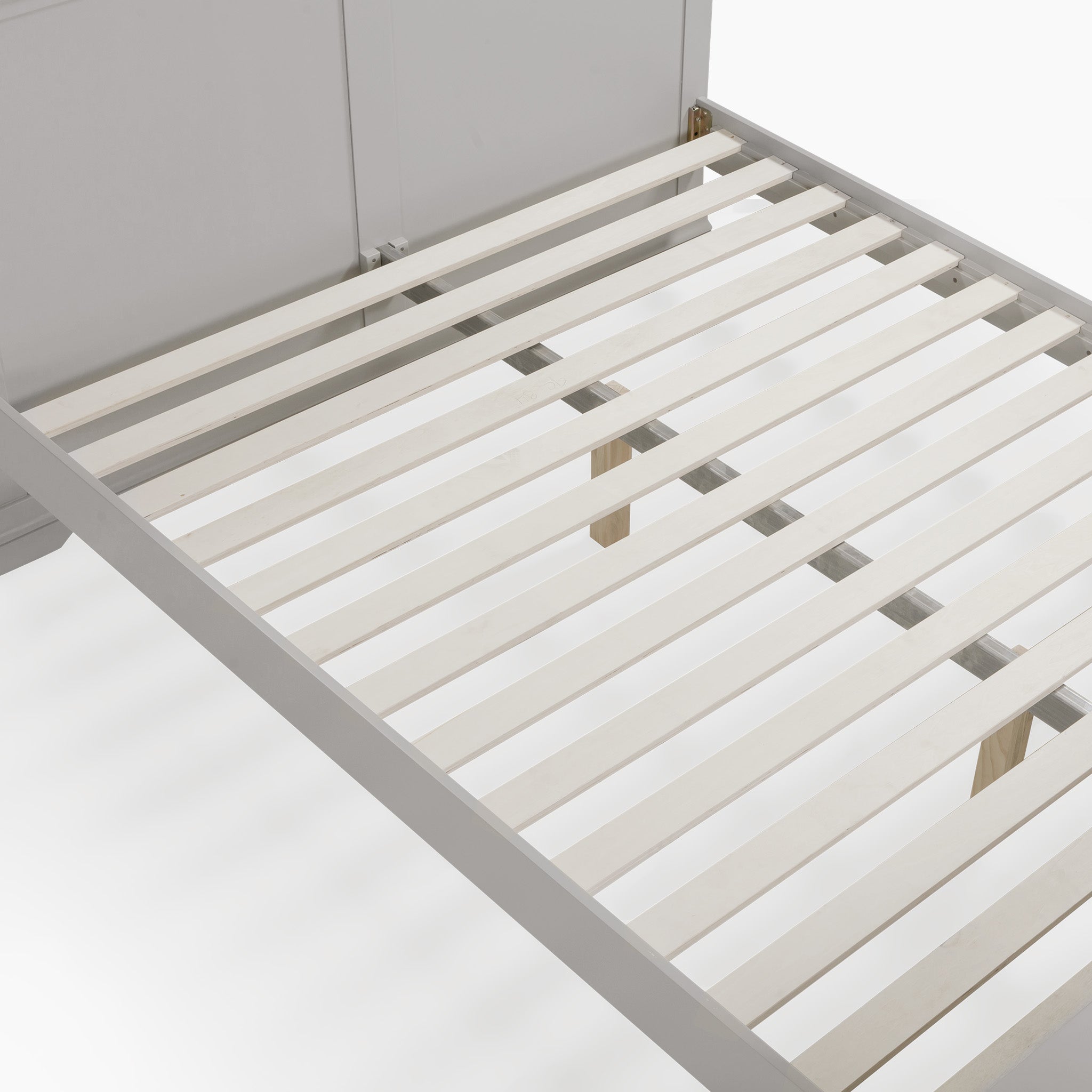 The Chalbury 5ft High-End Kingsize Bed Frame in Pebble Grey features a contemporary design with wooden slats and extends elegantly from a cabinet.