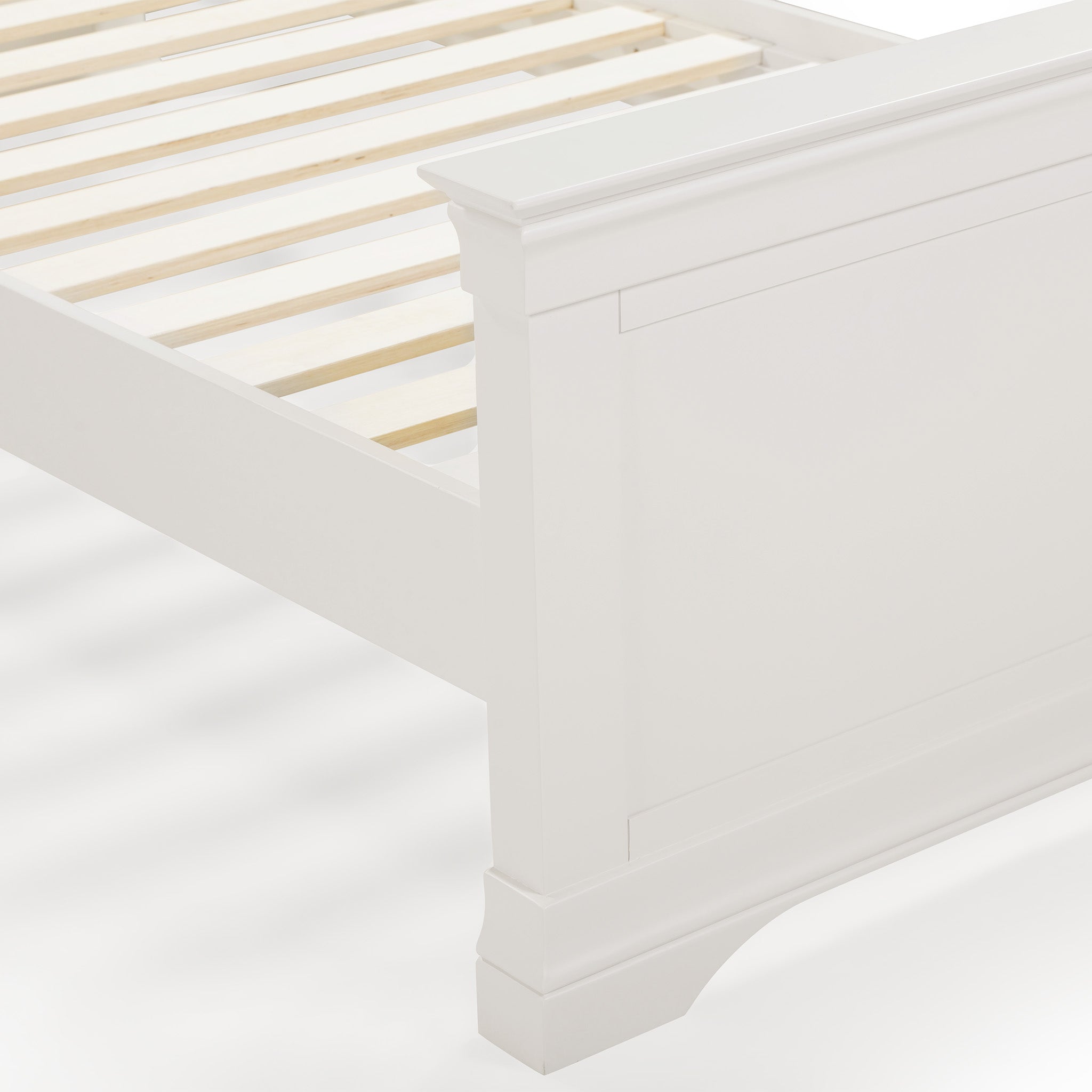 The Chalbury 3ft High-End Single Bed Frame in warm white is crafted from white wood and features a slatted base and paneled headboard, elegantly set against a clean, white background.