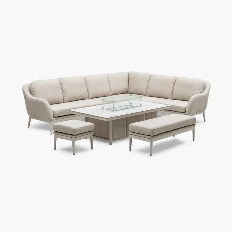 The Luna Outdoor Fabric Rectangular Corner Dining Set in Fawn (Right Hand) includes a sectional sofa crafted from all-weather materials and features a versatile rising firepit table, displayed against a white background.