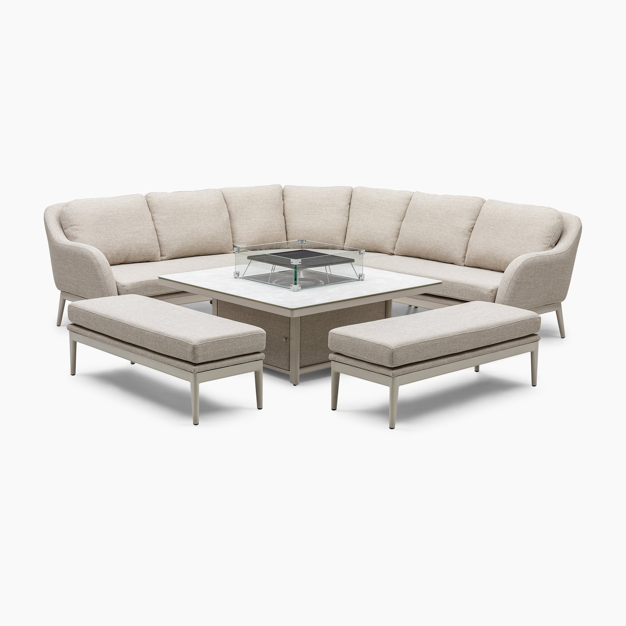 The Luna Deluxe Outdoor Fabric Square Corner Dining Set with a Rising Firepit Table in Fawn features a white sectional sofa accompanied by two coordinating benches, all crafted from maintenance-free materials and arranged around a central firepit table.