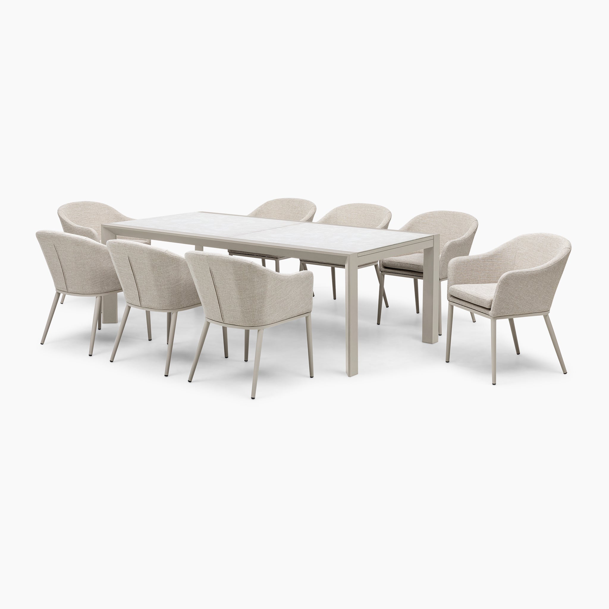 The Luna 8 Seat Outdoor Fabric Extending Ceramic Dining Set in Fawn showcases a modern design with a white rectangular table and eight upholstered chairs, crafted in durable all-weather fabric, set against a pristine white backdrop.