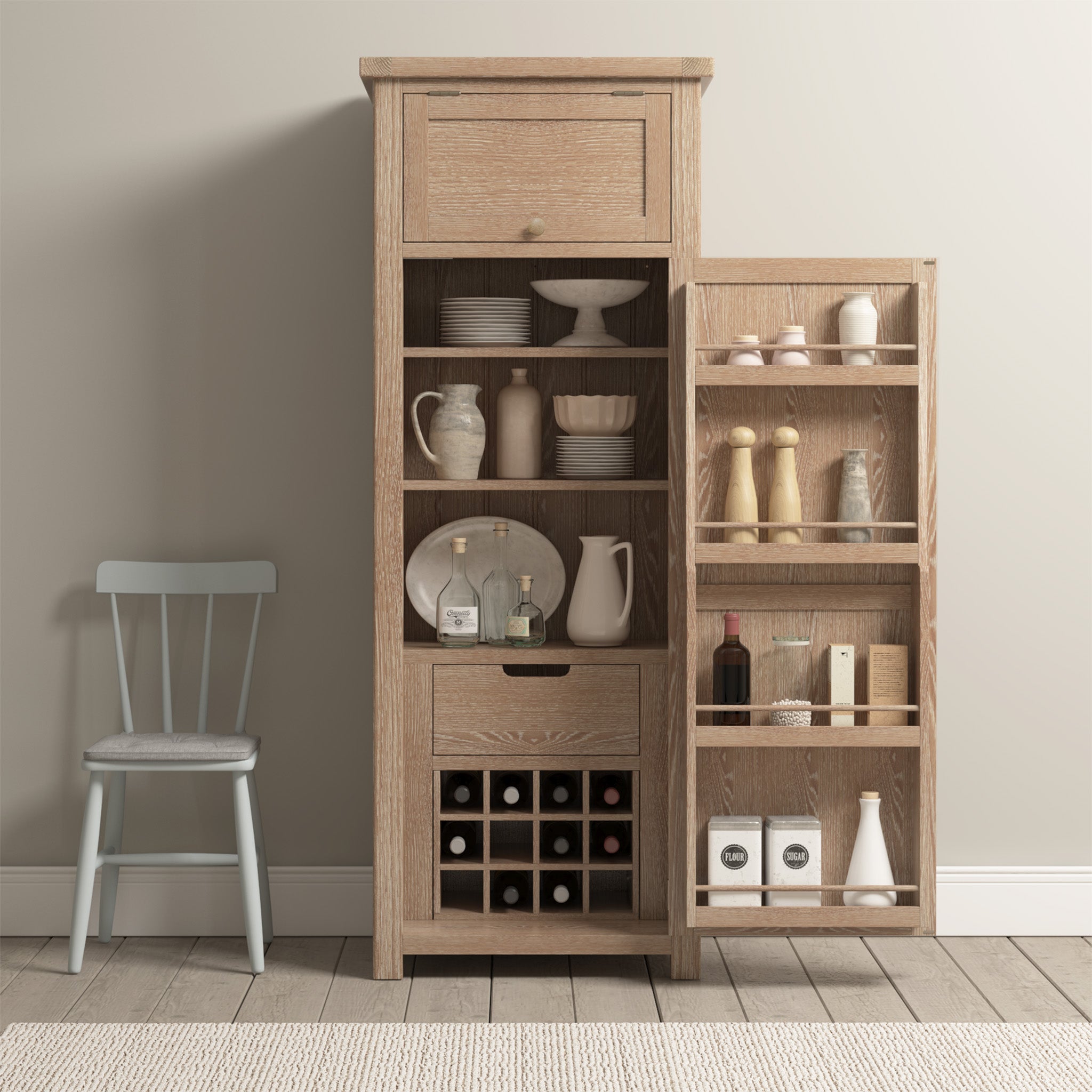 The Burford Single Larder Unit in Natural Oak, with its smart storage solutions and shelves, efficiently organizes crockery, spices, and bottles. To the left sits a blue chair on a rug that perfectly complements the wooden floor.