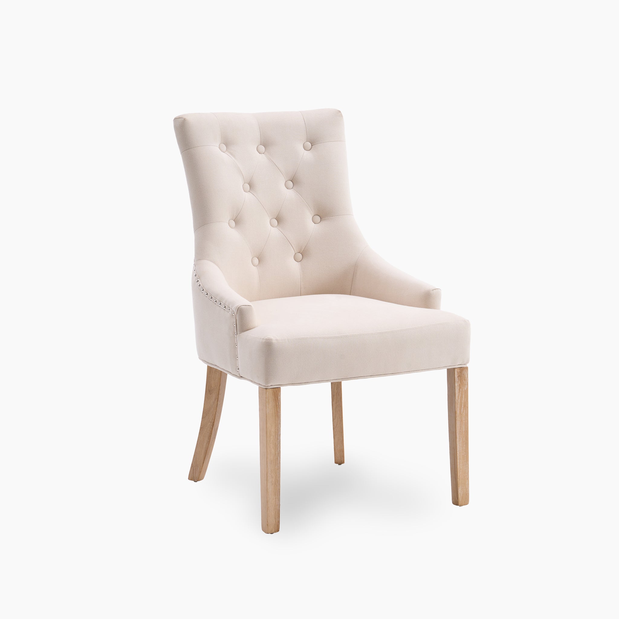 Ivory upholstery graces the Regent Chair Set of 2, showcasing a tufted backrest and sophisticated wooden legs against a white background.