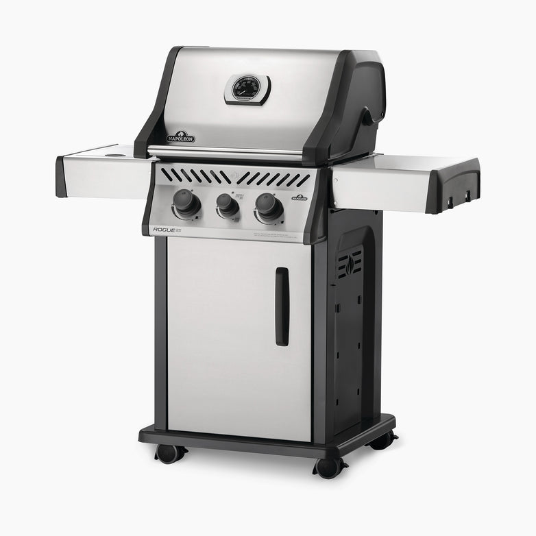 Introducing the Napoleon Rogue XT 365 SIB Gas Barbecue: a stainless steel propane gas grill equipped with three burners, cast iron grids, side shelves, an infrared side burner, and wheels for easy mobility.