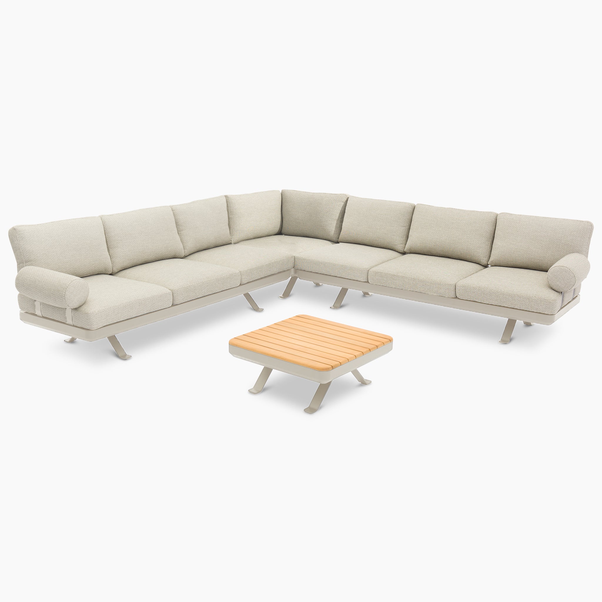 The Vienna Corner Group Set in Latte features a beige L-shaped sectional sofa with cushions and a matching teak-topped coffee table on a white background, making it perfect for outdoor living.