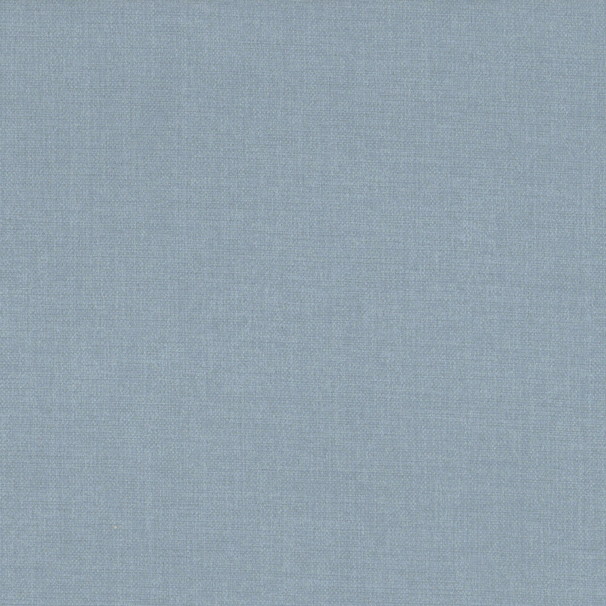 The Sky Blue Fabric, featuring a textured design with a subtle soft weave pattern, creates a tranquil atmosphere in elegant interiors.