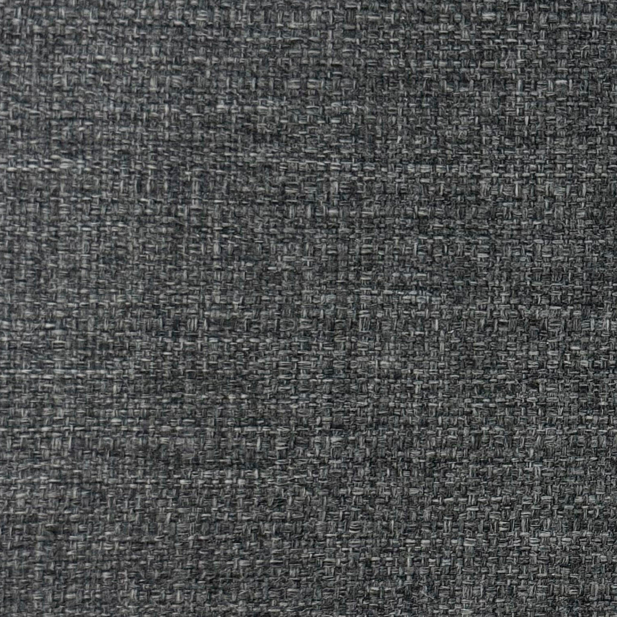 The Textured Charcoal features a dark gray fabric with a woven pattern of intersecting lines, offering a subtle and uniform appearance.