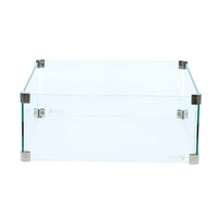 The Cosi - Cosiglass Set Square Fire Pit Large is a transparent glass square box with robust metal corner brackets, ideal for adding elegance to any white background.