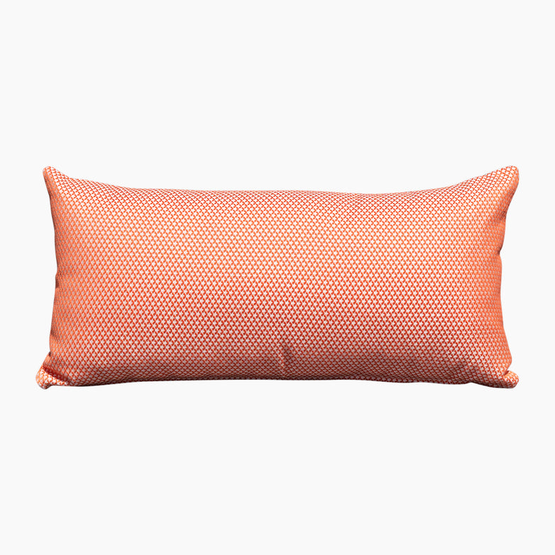 The Agora Scala Coral Bolster Scatter Cushion (60cm x 30cm) features a rectangular shape and a striking red and white geometric pattern, made from solution-dyed acrylic to ensure enhanced durability.