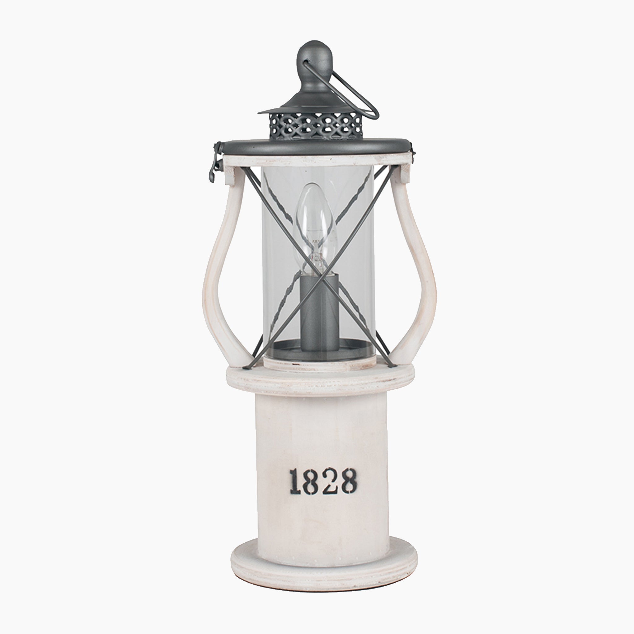 The Pacific Lifestyle - Gibson Wood Lantern Table Lamp features elegant glass and metal accents, marked with "1828" on its white base. This vintage-style piece resembles a Victorian lantern, adding old-world charm to any setting.