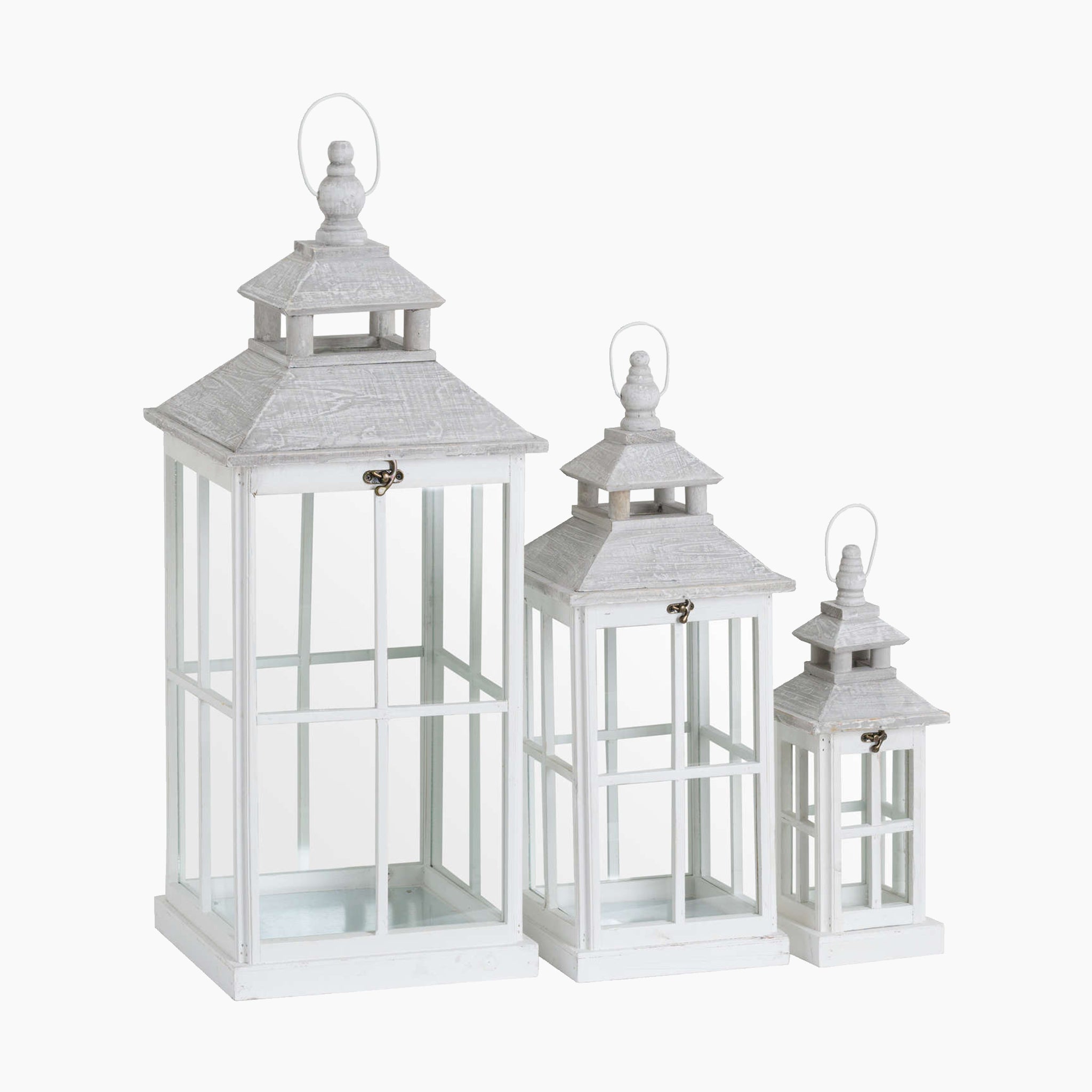 The Set Of 3 White Window Style Lanterns With Open Top, each featuring a glass panel and a small loop on top for easy hanging, are part of an exquisite lighting collection.